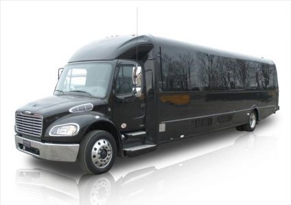 Black 36 passenger limo bus on display